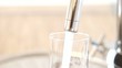 Filling glass of clean water