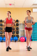 Young women doing fitness in a health club Young women doing fitness in a health club