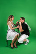 A girl and man isolated on green A girl and man isolated on green