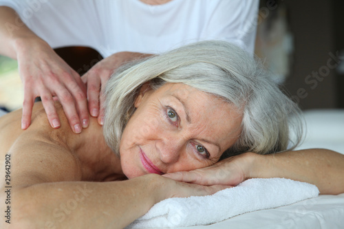 Photo: Senior woman having a massage Senior woman having a massage