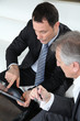Senior couple discussing financial plan with consultant