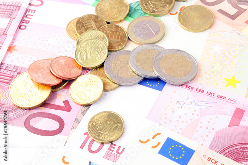 Photo: Banknoten und Münzen Banknoten und Münzen
