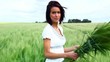 Happy young woman on cereal field in summer - Outdoor