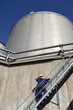 engineer with fuel-storage tank