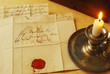 Old letter read by candle light from 1800's