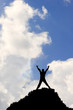 Photo: Silhouette man stretching towards sky in achievement victory Silhouette man stretching towards sky in achievement victory