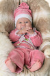 Beautiful newborn baby girl on vintage background