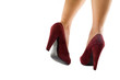 piedi femminili con scarpe rosse