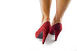 piedi femminili con scarpe rosse