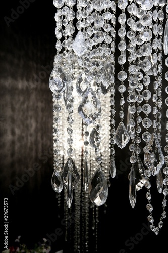Photo: crystal strass lamp white over black background crystal strass lamp white over black background