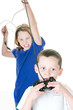 kids fighting over video controller