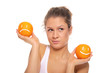 Woman with two oranges  different emotions