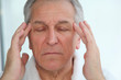 Senior man having a headache