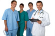 Portrait of doctor with three practitioners in the background