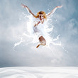 Jump of ballerina with dress of milk