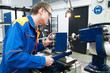 worker at machine tool operating worker at machine tool operating
