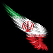 Abstract wing with Iranian flag on black background