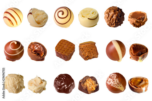 Photo: collection of mixed chocolates against a white background collection of mixed chocolates against a white background