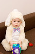 Pretty caucasian baby in rabbit costume playing Pretty caucasian baby in rabbit costume playing