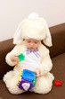 Pretty caucasian baby in rabbit costume playing Pretty caucasian baby in rabbit costume playing