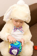Pretty caucasian baby in rabbit costume playing Pretty caucasian baby in rabbit costume playing