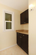New brown black cabinets in the corner