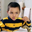 Kid brushing teeth