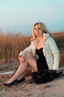 Photo: Girl sitting on the beach Girl sitting on the beach