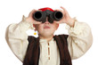 Photo: Piratenkind sieht durch Fernglas Piratenkind sieht durch Fernglas