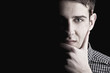 Portrait of young man thinking