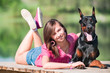 Young beautiful girl with a dog