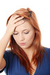 Woman with headache holding her hand to the head