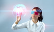 Photo: Touching 3D globe. Brunette in anaglyph stereo glasses. Touching 3D globe. Brunette in anaglyph stereo glasses.