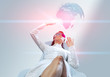 Foto: Touching 3D globe. Pretty girl in anaglyph stereo glasses. Touching 3D globe. Pretty girl in anaglyph stereo glasses.