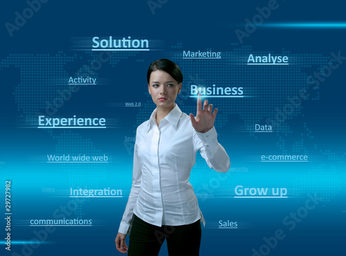 Photo: Web 2.0 Girl. Words cloud, pressing the BUSINESS. Web 2.0 Girl. Words cloud, pressing the BUSINESS.