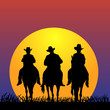 Three Cowboys at sunset