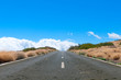 Desert road stretching into horizon, Lanzarote island, Canary