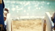 Video: Rear view of a couple having drinks by the pool Rear view of a couple having drinks by the pool