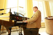 Young pianist at an afternoon lounge