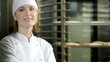 Portrait of a female baker at work; HD 720, H 264, dolly.