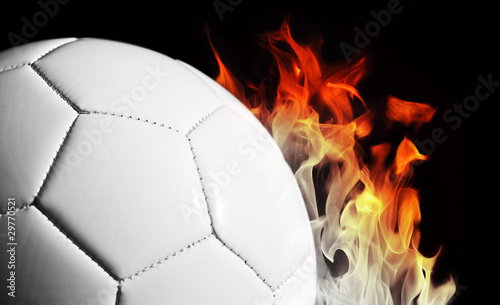 Photo: football and flames football and flames