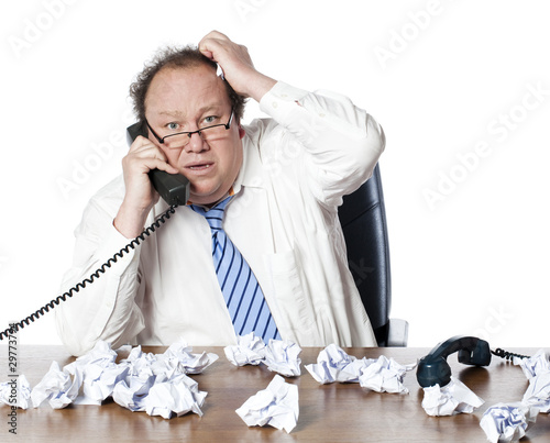 Photo: homme d'affaires débordé au téléphone homme d'affaires débordé au téléphone