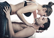 Young couple in blue jeans on white background Young couple in blue jeans on white background