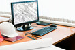 Working place with computer and project drawings in screen