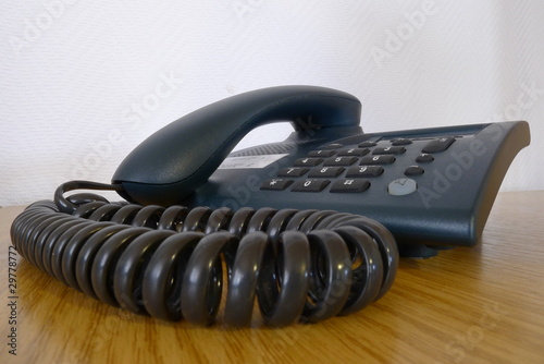 Foto: Telefon auf dem Schreibtisch im Büro Telefon auf dem Schreibtisch im Büro