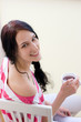 Caucasian young woman with cup of tea Caucasian young woman with cup of tea