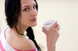 Caucasian young woman with cup of tea Caucasian young woman with cup of tea