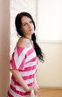 Caucasian young woman in light room Caucasian young woman in light room