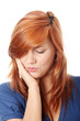 Young woman in pain is having toothache