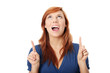 Young beautiful happy caucasian woman pointing up